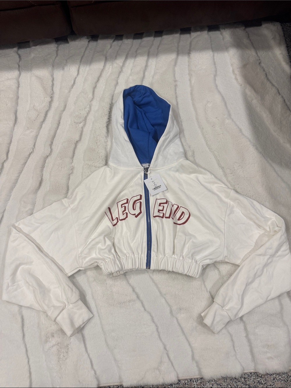 Adika White Cropped Hoodie with Blue Lined Hood and Red 'LEGEND' Text